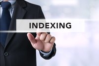 Hand of a person in a suit is pointing to the word Indexing.