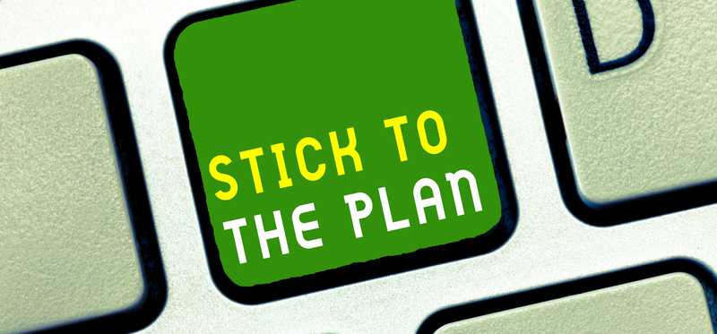 A keyboard key is shown, labeled with the words stick to the plan.