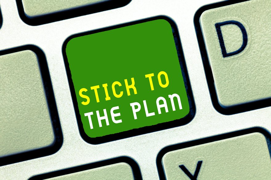 A keyboard key is shown, labeled with the words stick to the plan.