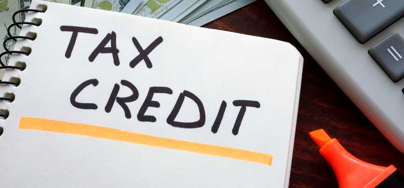 The words Tax Credit written on paper
