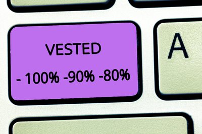 Keyboard key labeled Vested with different percentages.
