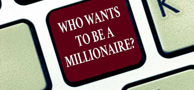 A keyboard key labeled Who Wants to Be a Millionaire