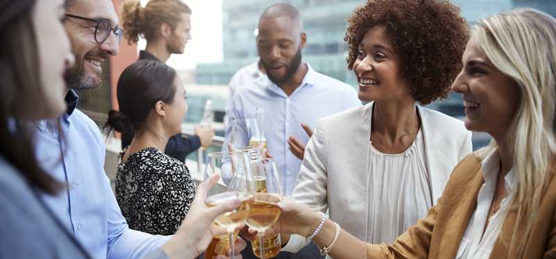 Group of businesspeople socializing.