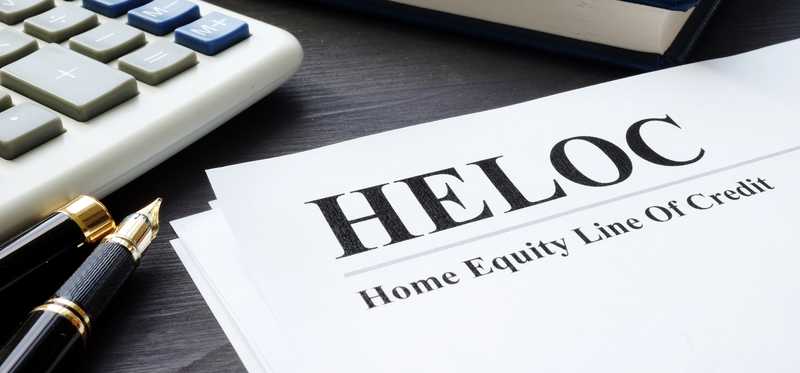 Home equity line of credit documents on a table.