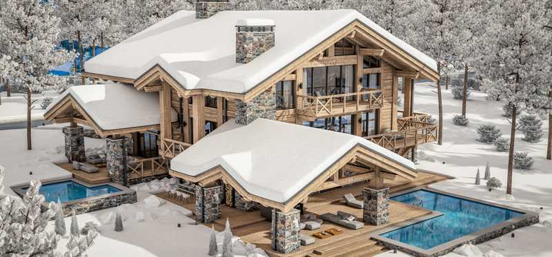 High-end home in mountains covered in snow.