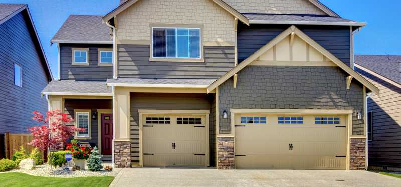 A two-story brick home.