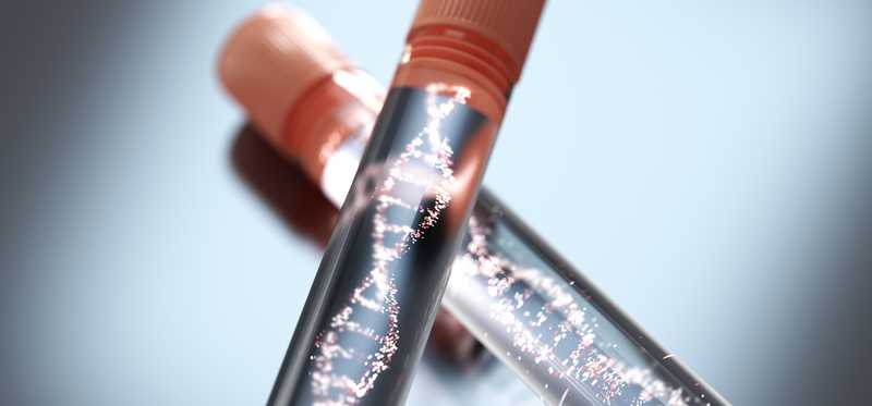 Two glass vials with liquid and DNA sequence inside.