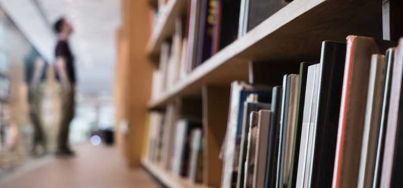An aisle in a bookstore.