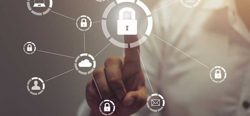 Finger choosing a padlock option from a virtual cloud screen.