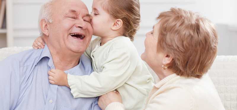 Grandparents with toddler grandchild.