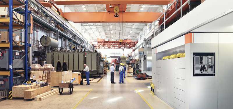 People inside an industrial building.