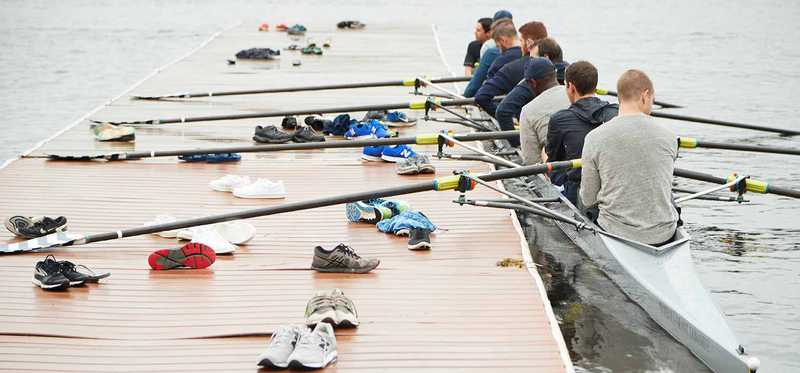 Young men row a crew ship