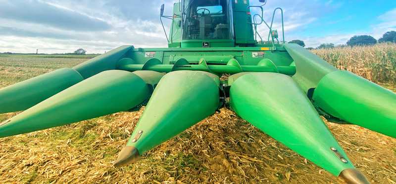A large, green farm machine.