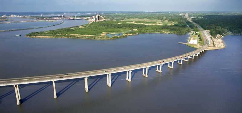 An aerial shot of a highway bridge and waterways at Lake Charles, Louisiana.