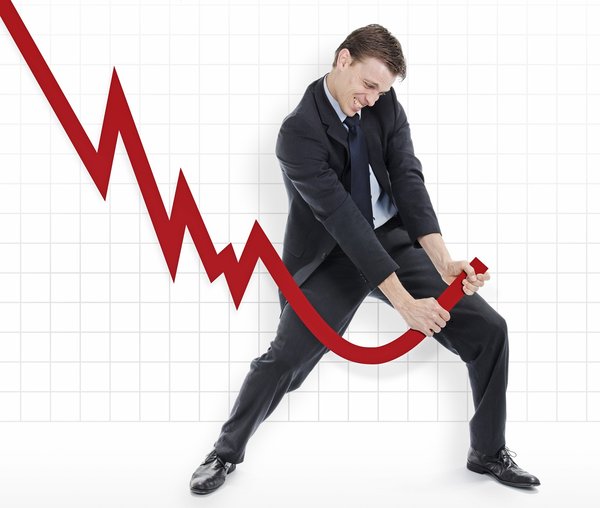 A person grabs the end of a downward-trending line graph and turns it back upward.