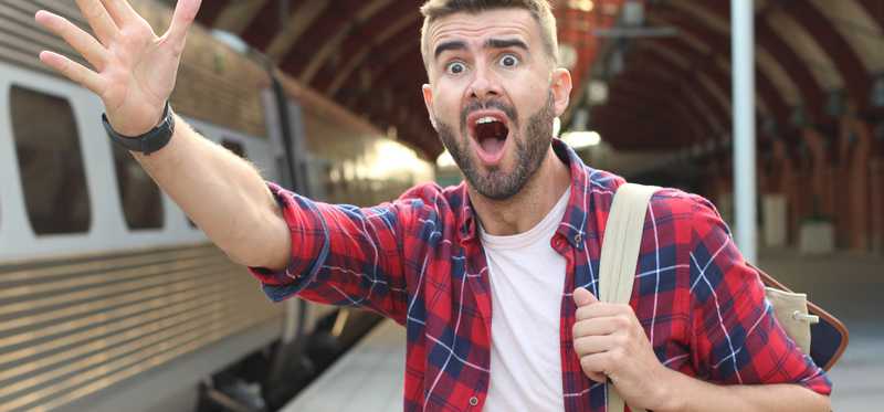 Man yelling out after missing departing train.