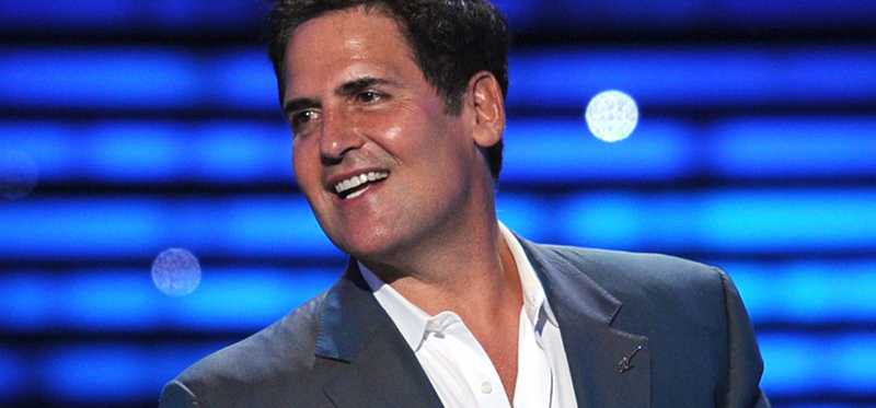 Mark Cuban speaking on a stage.