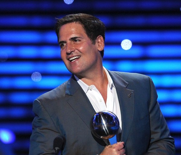 Mark Cuban speaking on a stage.
