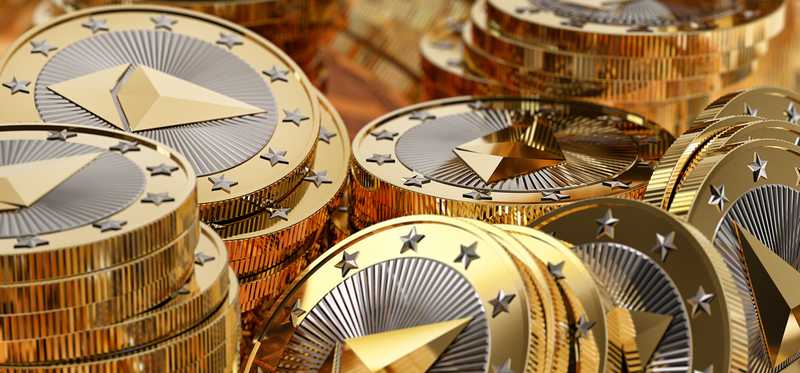 Messy piles of physical gold and silver Ether coins.