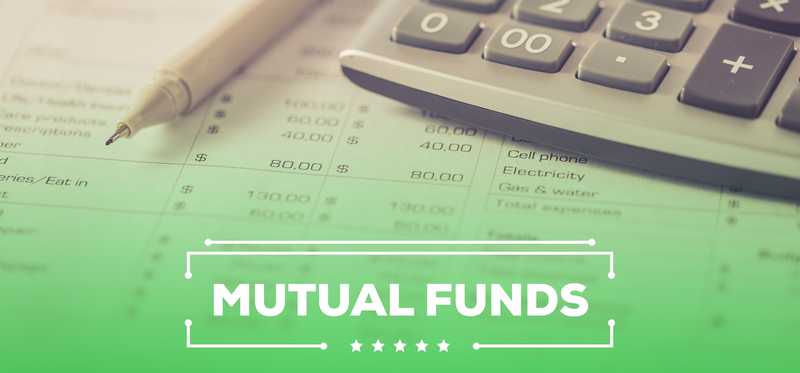 The words Mutual Funds superimposed over financial data and a pen and calculator.