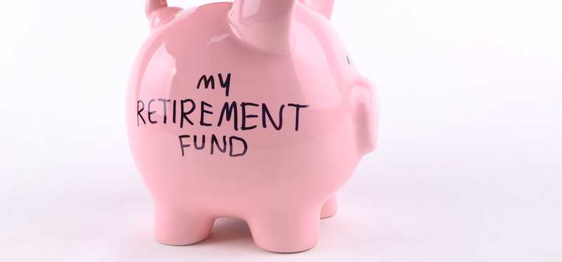 Piggy bank with My Retirement Fund written on it in marker.