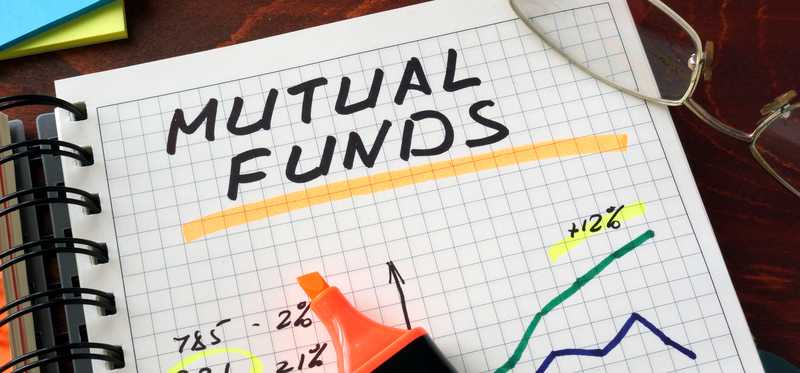 Notebook with mutual fund data.