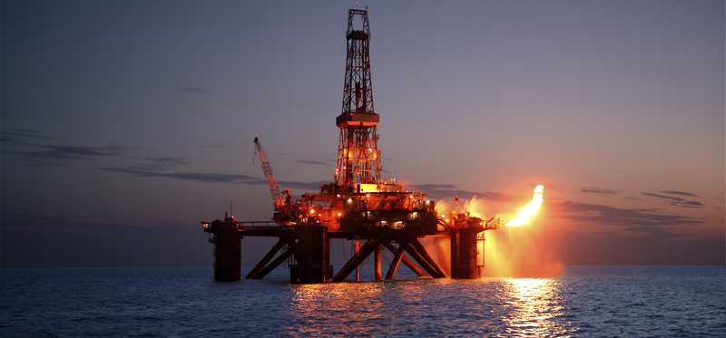 Offshore drilling rig flaring natural gas.