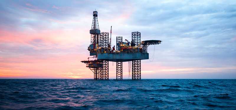 Offshore oil rig at daybreak