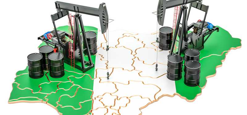 Oil pumps and barrels on the flag of Nigeria shaped like a map of the country.