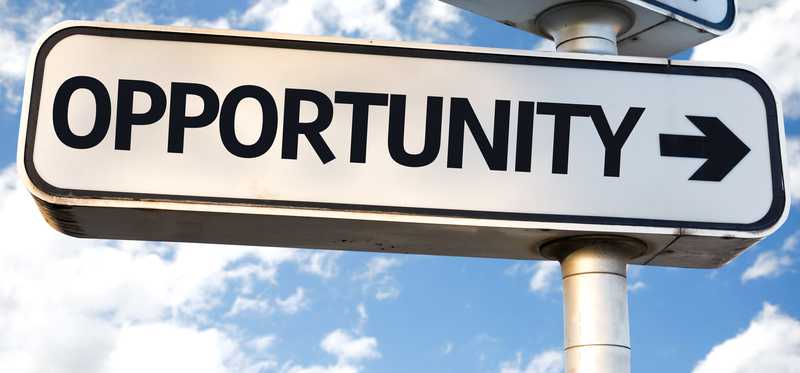 A sign with an arrow says opportunity.