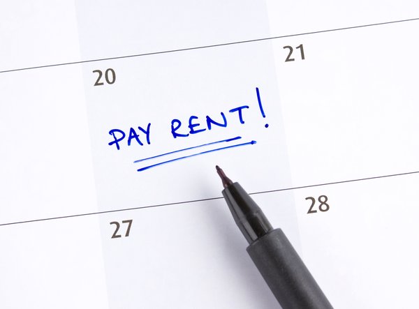Calendar with the words Pay Rent written on it.