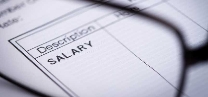 Close-up of a paycheck