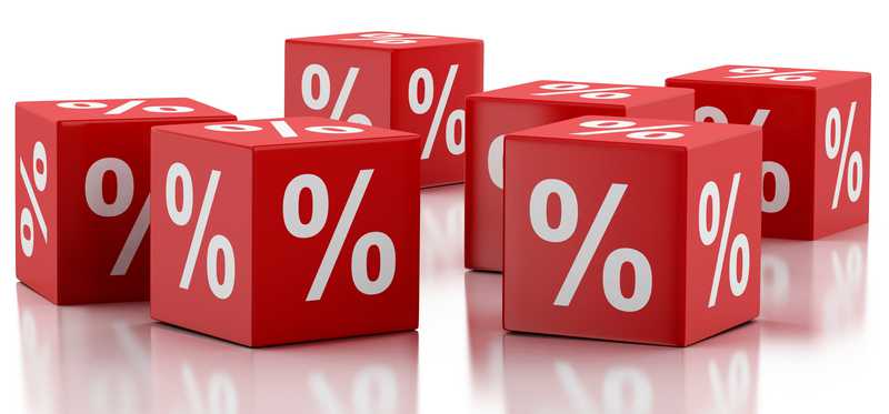 Red dice with percentage signs on them.