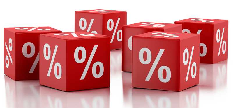 Red dice with percentage signs on them.