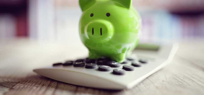 Piggy bank on a calculator.
