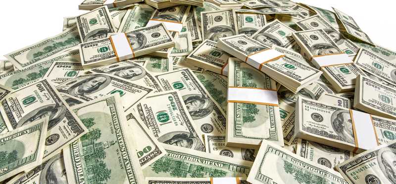 $100 dollar bills in a huge pile