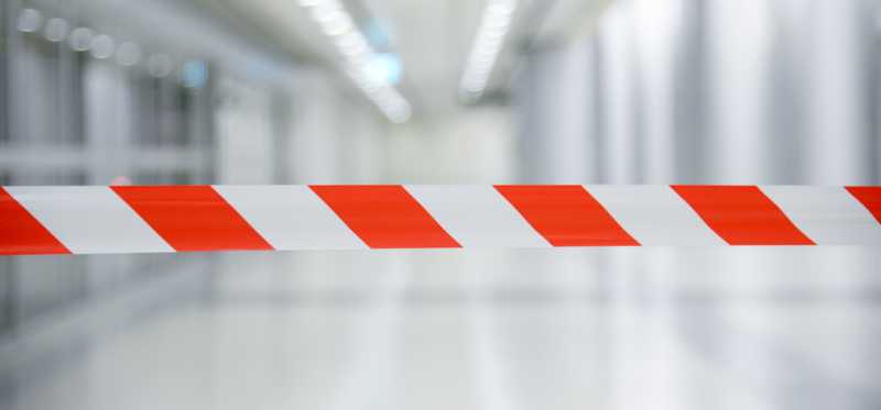Barrier tape with red and white lines.