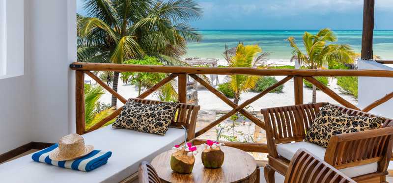 Ocean view from the balcony of a resort on the beach.