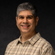Headshot image of Asit Sharma.