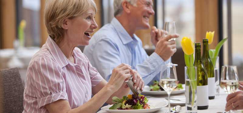Seniors eating in a restaurant.
