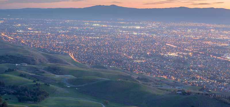 Silicon Valley and green hills at dusk from Monument Peak, California.
