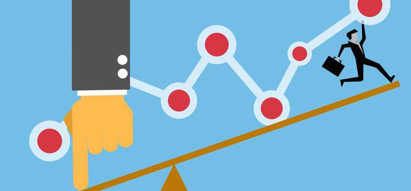 Graphic of business man at top of fulcrum.