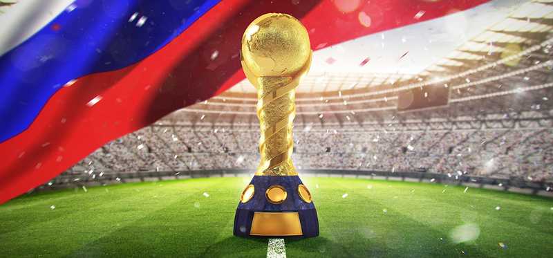 Soccer trophy and Russian flag superimposed on a soccer field.