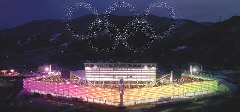 The Olympic arena with Olympic rings above it.