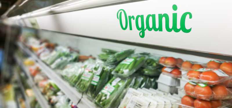 An aisle of organic produce.