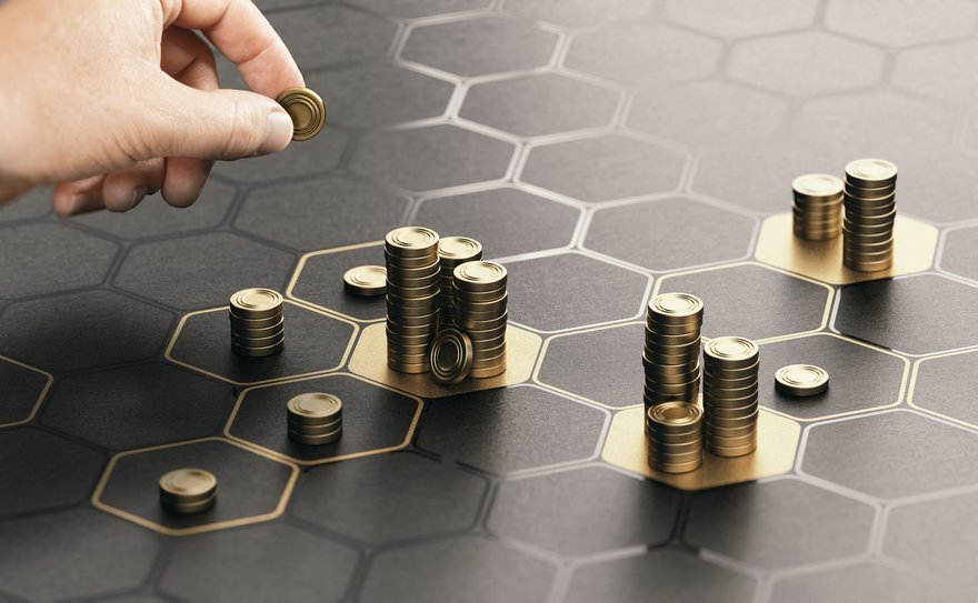 Stacks of coins on patterned table