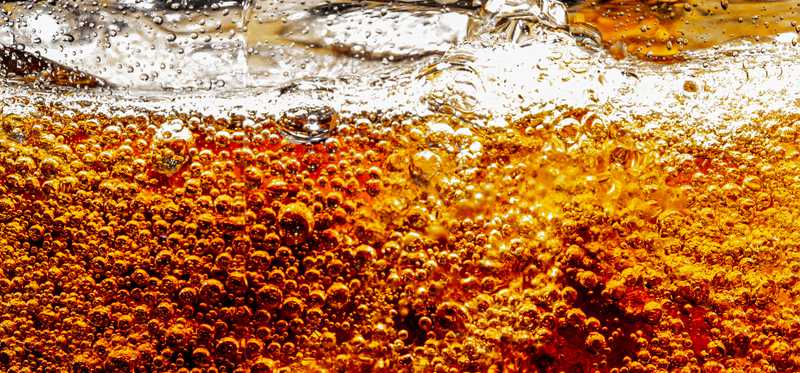 Brown soda carbonation bubbles