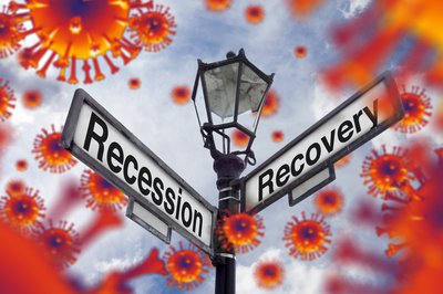 Street signs saying Recession and Recovery at an intersection.