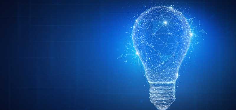 A digital light bulb on a dark blue screen.
