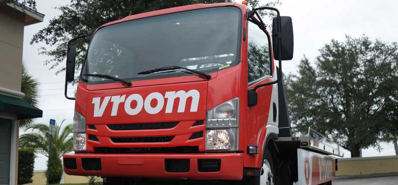 A Vroom flatbed vehicle.